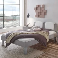 Bett in Betonoptik mit Kopfteil Kissen - Rienas^Wohnen Outlet