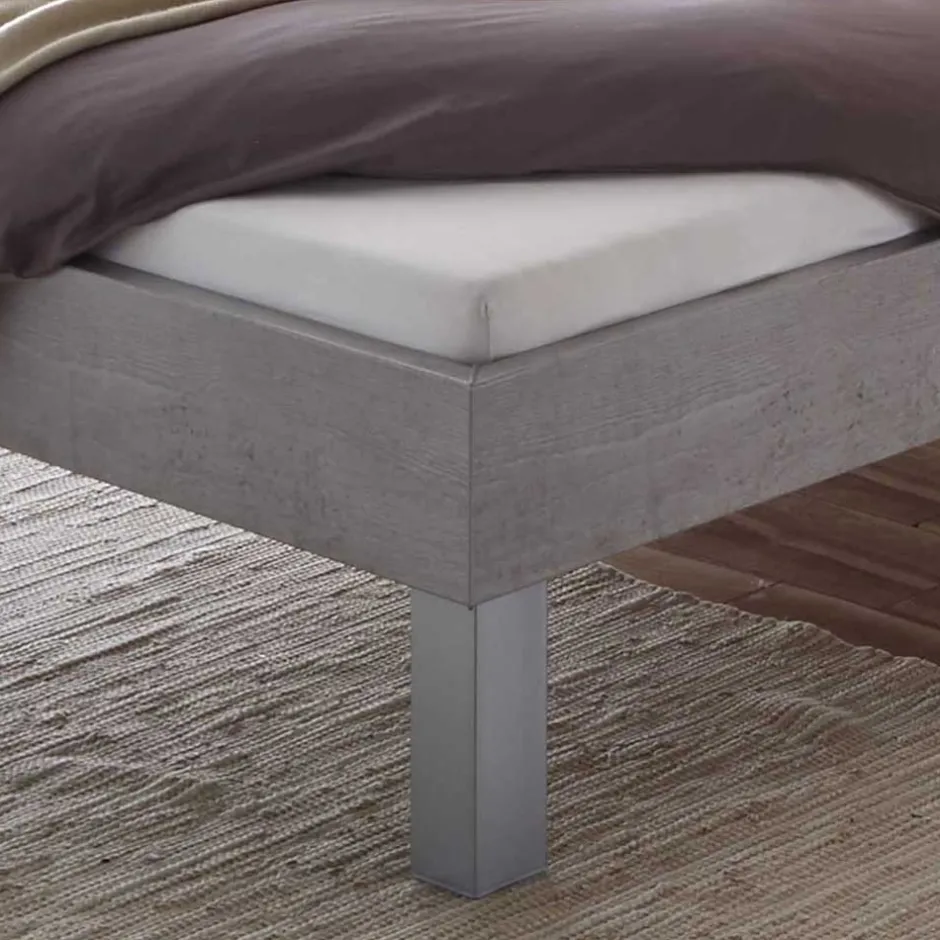 Bett in Betonoptik mit Kopfteil Kissen - Rienas^Wohnen Outlet