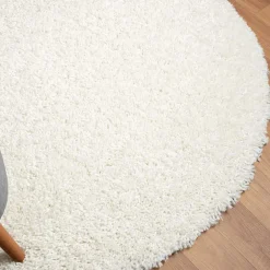 Cremefarbener Teppich mit hohem Flor - Vacance^Wohnen