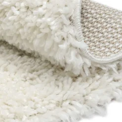 Cremefarbener Teppich mit hohem Flor - Vacance^Wohnen