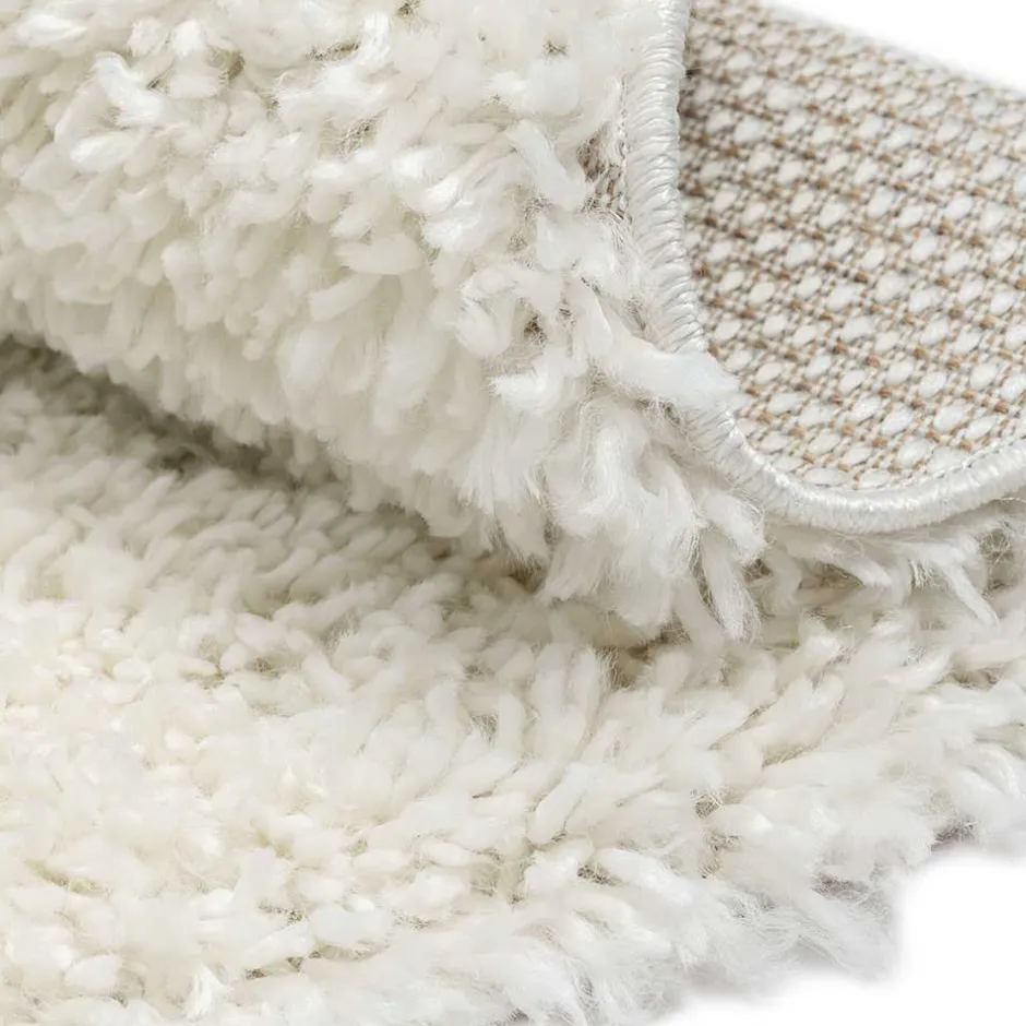 Cremefarbener Teppich mit hohem Flor - Vacance^Wohnen