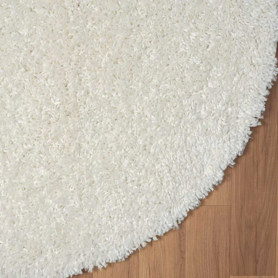 Cremefarbener Teppich mit hohem Flor - Vacance^Wohnen