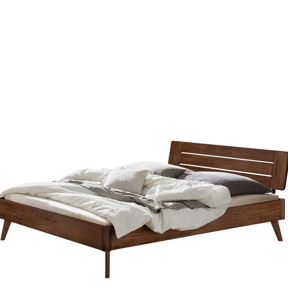 Wohnen Dunkles Holzbett aus Nussbaum Massivholz - Vetonia