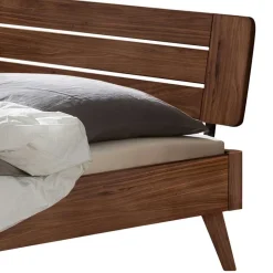 Wohnen Dunkles Holzbett aus Nussbaum Massivholz - Vetonia