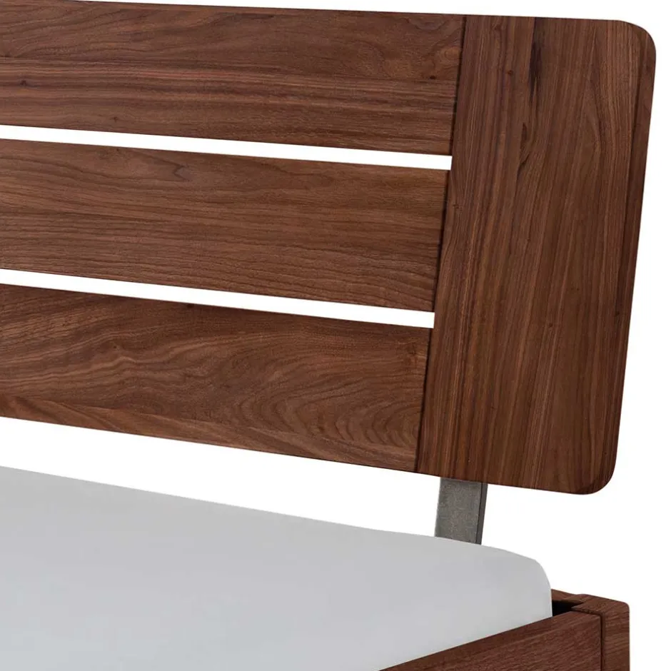 Wohnen Dunkles Holzbett aus Nussbaum Massivholz - Vetonia