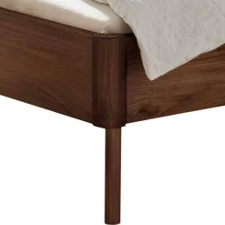 Wohnen Dunkles Holzbett aus Nussbaum Massivholz - Vetonia