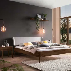 Wohnen Nussbaum Bett mit extravagantem Kopfteil - Astosa